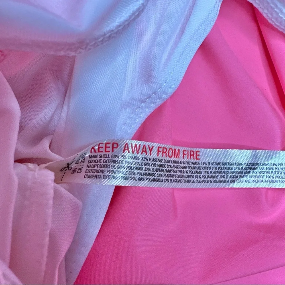 NWT Free People Movement Righteous Runsie Flamingo Fizz Pink Cutout Romper - Picture 8 of 11